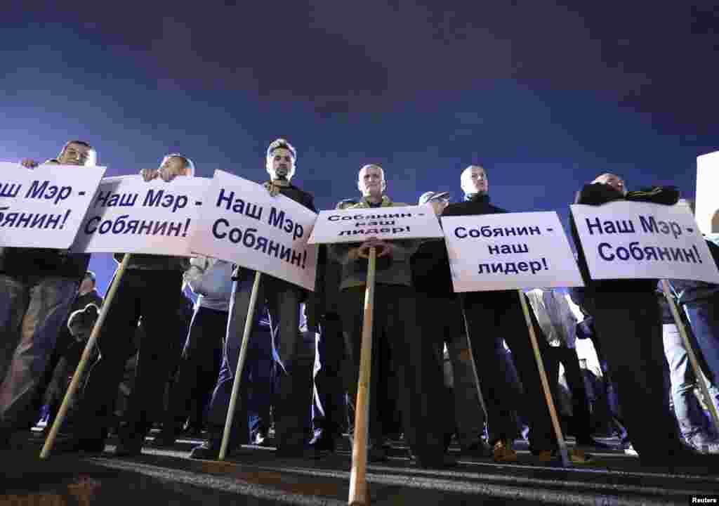 Supporters of acting Moscow Mayor Sergei Sobyanin hold a rally after voting in a mayoral election in Moscow, on September 8. Sobyanin won the vote in the first round, although opponents have disputed the result.&nbsp; (Reuters/Sergei Karpukhin)