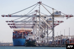 Ships lie docked on the wharf of the Egyptian Mediterranean sea port of Damietta. (file photo)