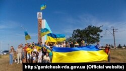Geniçeskte ukrainalı faaller. Nümünelik fotosuret