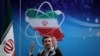 President Mahmud Ahmadinejad delivers a speech to Iran's Atomic Energy Organization scientists during a ceremony to mark National Nuclear Day in Tehran in April 2012.