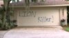 "Убийца льва" – надпись, оставленная на двери гаража загородного дома Уолтера Палмера во Флориде
