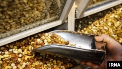 Mixed nuts sold in Tehran market before Norooz celebrations. March 2019