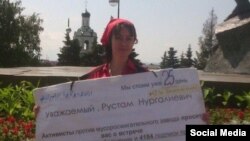 Участница протеста против мусоросжигательного завода в Казани.