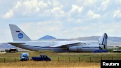 A Russian plane carrying parts of a Russian S-400 missile=defense system is pictured at Akinci air base near Ankara, Turkey, on July 12.