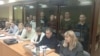 Обвиняемые за стеклом. Слева направо: Альфинур Рахматуллина, Юлай Аюпов, Салават Елкибаев, Самат Давлетов, Ахмет Якупов, Артур Мухаметов, Закир Ахмедин, Ильяс Байгускаров. Фото: Telegram-канал "Байгускар"