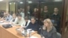 Обвиняемые за стеклом. Слева направо: Альфинур Рахматуллина, Юлай Аюпов, Салават Елкибаев, Самат Давлетов, Ахмет Якупов, Артур Мухаметов, Закир Ахмедин, Ильяс Байгускаров. Фото: Telegram-канал "Байгускар"