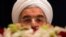 Iranian President Hassan Rohani takes questions from journalists at a news conference in New York in September. 