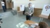 Armenia -- A voter is about to cast a ballot in municipal elections in Yerevan, 23Sep2018