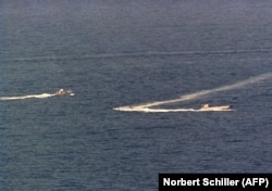 Iranian speedboats photographed seconds before opening fire on a news helicopter off the coast of Dubai in December 1987.