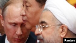 از راست: روحانی، شی، پوتین؛ روسای جمهوری ایران، چین و روسیه، در سال ۲۰۱۴ در شانگهای