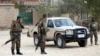 Afghan National Army soldiers keep watch at the site of a suicide attack in Kabul on October 31.