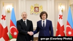 ილჰამ ალიევი და ირაკლი კობახიძე 6 აპრილს თბილისში, საქართველოს მთავრობის ადმინისტრაციაში.