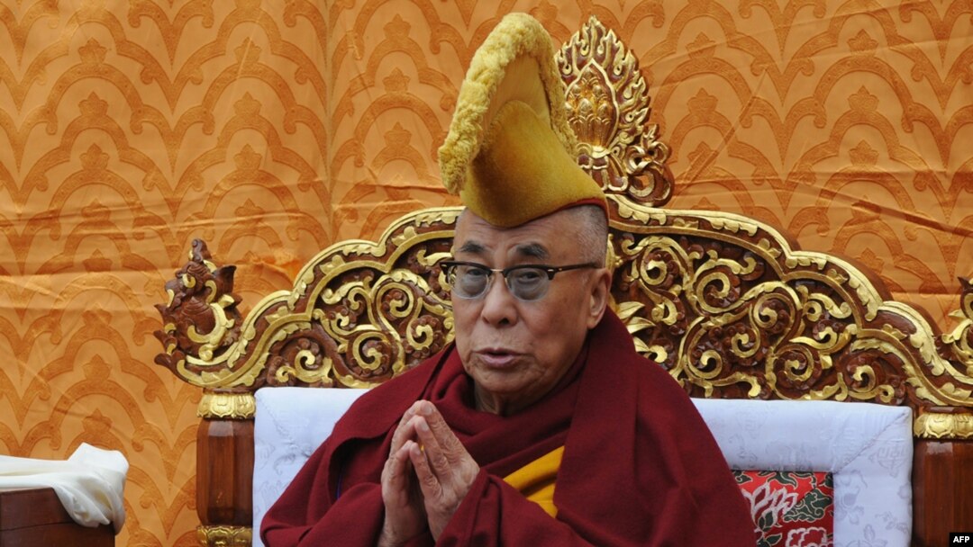Tibetan spiritual leader the Dalai Lama prays to mark the first day of Losar, the Tibetan New Year of The Water Dragon 2139, at Tsuglakhang Temple in McLeodganj, India, in February 2012.