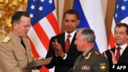 Schimb de documente la Kremlin în prezența președinților SUA și Rusiei