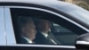 In this pool photograph distributed by Russian state agency Sputnik, Azerbaijan's President Ilham Aliyev (R) and Russia's President Vladimir Putin (L) drive a car following their talks in Baku on August 19, 2024.