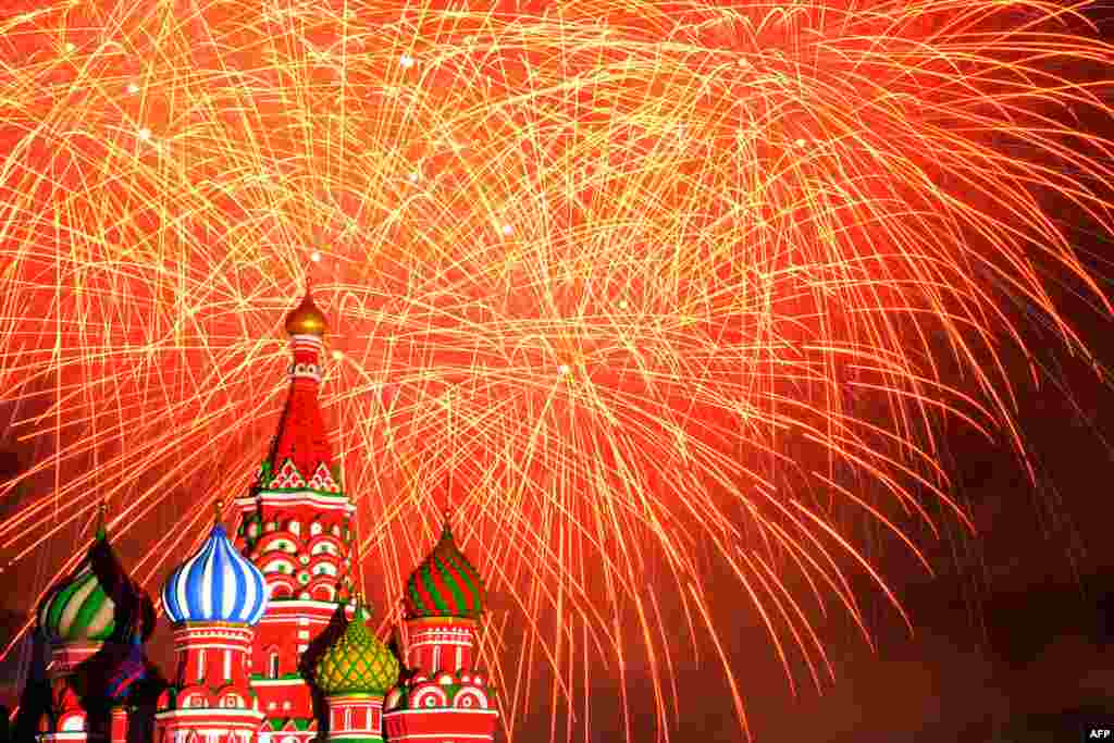 Fireworks explode above St. Basil's cathedral during the Spasskaya Tower international military and music festival on Moscow's Red Square. (AFP/Kirill Kudryavtsev)