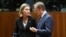  EU foreign policy chief Federica Mogherini talks to European Council President Donald Tusk during an EU leaders summit in Brussels, December 18.