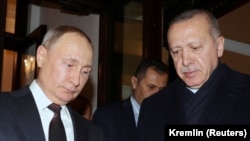 Vladimir Putin (solda) və Recep Tayyip Erdoğan