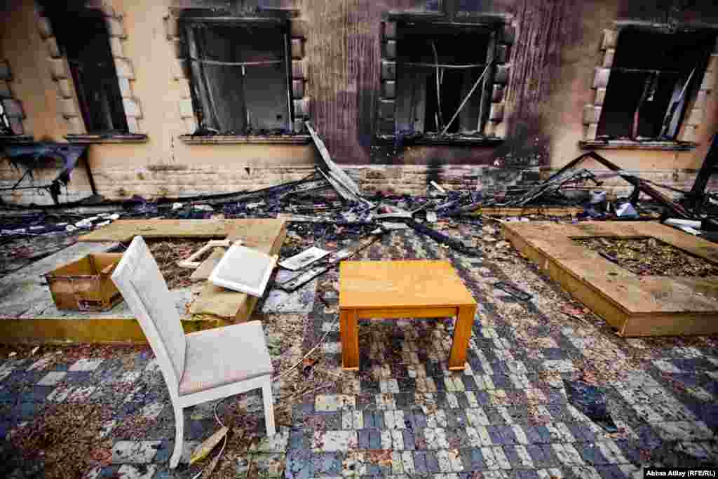 The burned shell of a building is seen on January 29 after violent protests erupted in the town of Ismayili, Azerbaijan. The protesters were demanding the resignation of the local governor, Nizami Alekberov.