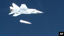 A screen shot from Russian TV allegedly showing a MiG-31 fighter jet releasing the new Kinzhal hypersonic missile during a test. (file photo)