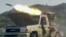 This screen grab taken from video footage released on September 8 by the Saudi-backed National Resistance Forces in Yemen shows a rocket being fired from a vehicle-based launcher in Yemen's western Taiz Province.