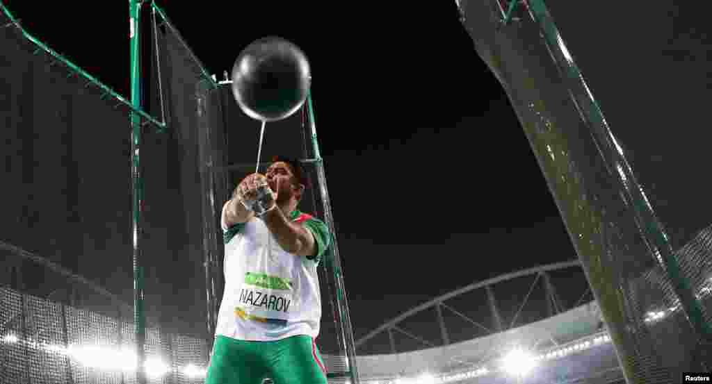 Dilshod Nazarov of Tajikistan on his way to winning the men&#39;s hammer competition. It was his country&#39;s first ever gold medal in the Olympics.