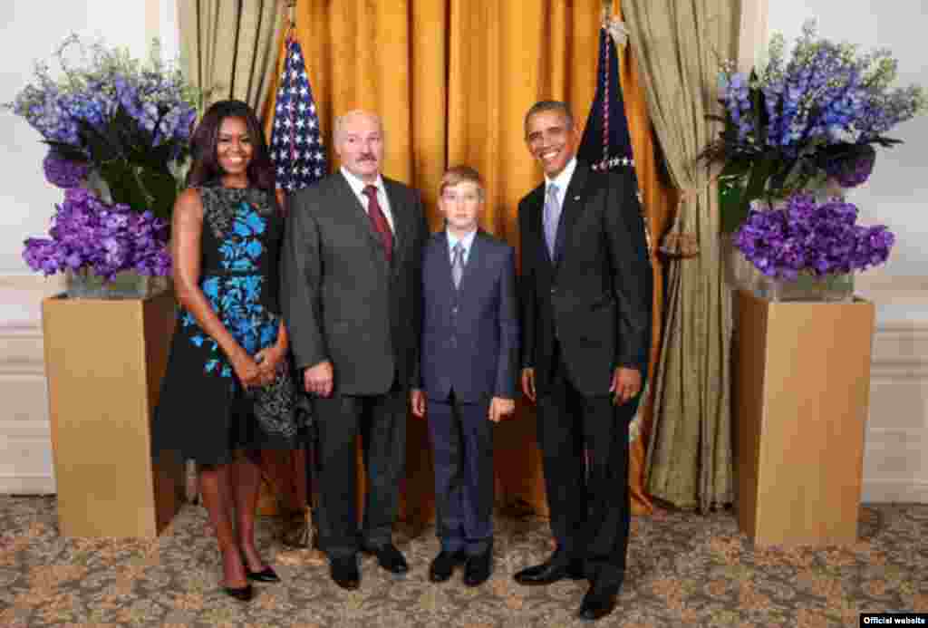 U.S. President Barack Obama and his wife, Michelle, pose with Lukashenka and Kolya during the UN General Assembly in New York on September 28.
