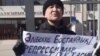 Kazakhstan - An activist Max Bokayev is protesting in front of the Atyrau police department. Atyrau, 13 March, 2021 