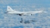 A Russian Blackjack bomber Tu-160 is intercepted and escorted by a French Mirage military fighter above French coast in this image taken and distributed by the French Air Force, February 9, 2017