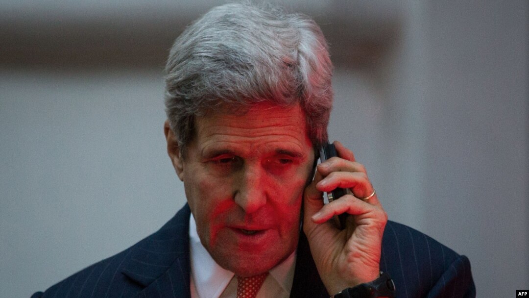 U.S. Secretary of State John Kerry talks on the phone in Vienna on November 21 during negotiations aimed at settling a dispute over Iran's nuclear program. 