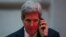 U.S. Secretary of State John Kerry talks on the phone in Vienna on November 21 during negotiations aimed at settling a dispute over Iran's nuclear program. 