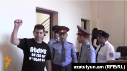 Armenia - Retired Colonel Volodya Avetisian (L) stands a trial on fraud charges, Yerevan, 26May2014