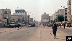 Security forces gather at the site of a deadly attack on a military parade in Aden, Yemen, on August 1.