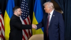 Ukraine's President Volodymyr Zelenskyy and US President Donald Trump shake hands during their meeting on the sidelines of annual World Economic Forum (WEF), in Switzerland in January.