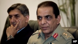 Pakistan's ISI chief Ahmad Shuja Pasha (left) and Army chief General Ashfaq Parvez Kayani at a June 2011 meeting