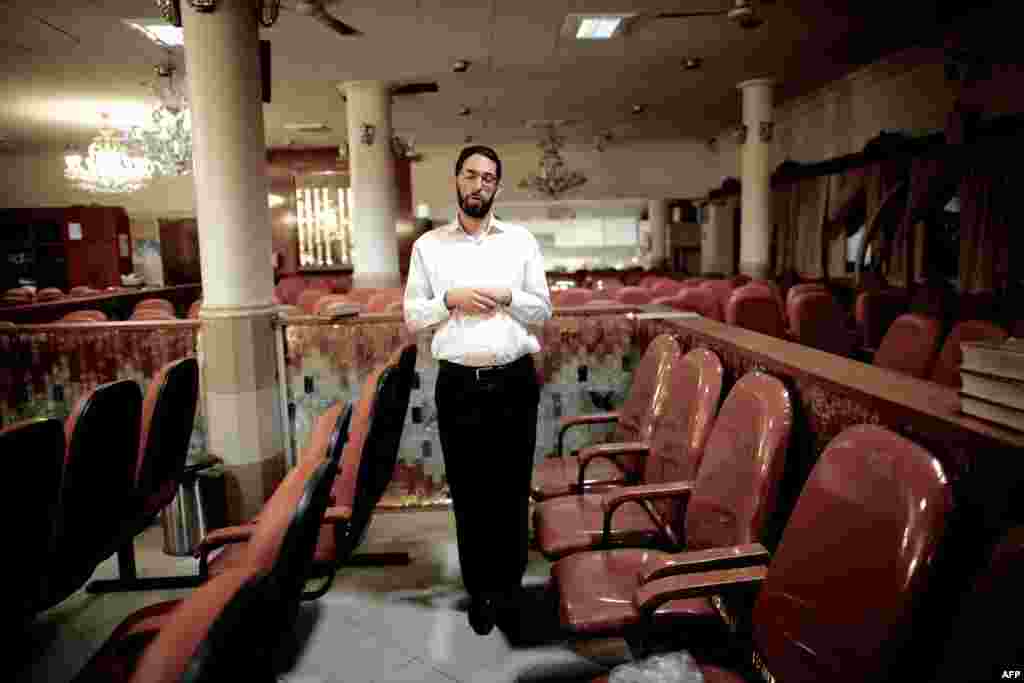 An Iranian Jew performs prayers at a Tehran synagogue.