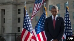 Барак Обама на траурной церемонии в память о жертвах терактов 11 сентября 2001 года. 