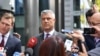Kosovar President Hashim Thaci talks to the press after meeting with Serbian President Aleksandar Vucic and EU foreign policy chief Federica Mogherini in Brussels on September 7.