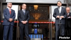 Armenia - Outgoing President Robert Kocharian, President-elect Serzh Sarkisian and Central Bank Chairman Tigran Sarkisian attend the inauguration of a commercial bank headquarters in Yerevan, 4Apr2008.