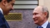 Venezuelan President Nicolas Maduro (left) and Russian President Vladimir Putin in Moscow on December 5