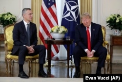 Trump ar reduce, mai mult ca sigur, suportul american pentru alianța nord-atlantică. Jens Stoltenberg, fostul secretar-general al NATO, se întâlnește cu Trump la Londra, 3 decembrie 2019.