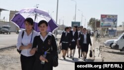 Uzbekistan - school girls are returning from school in Gijduvan town, 10Apr2012