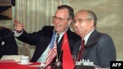 U.S. President George Bush (left) shares a joke with Soviet leader Mikhail Gorbachev in Malta in December 1989.