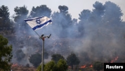Израилдин аймагында "Хезболланын" ракеталык соккусунан кийин тутанган өрт. 12-июнь, 2024-жыл.