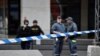 Sweden -- Police officers work at the scene where a truck crashed into the Ahlens department store at Drottninggatan in central Stockholm, April 7, 2017