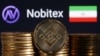 Iran - Representations of cryptocurrency Binance are seen in front of displayed Nobitex logo and Iran flag in this illustration taken November 3, 2022. 