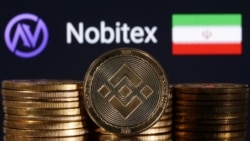 Iran - Representations of cryptocurrency Binance are seen in front of displayed Nobitex logo and Iran flag in this illustration taken November 3, 2022. 