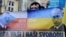 Акция протеста против политики Владимира Путина в Праге
