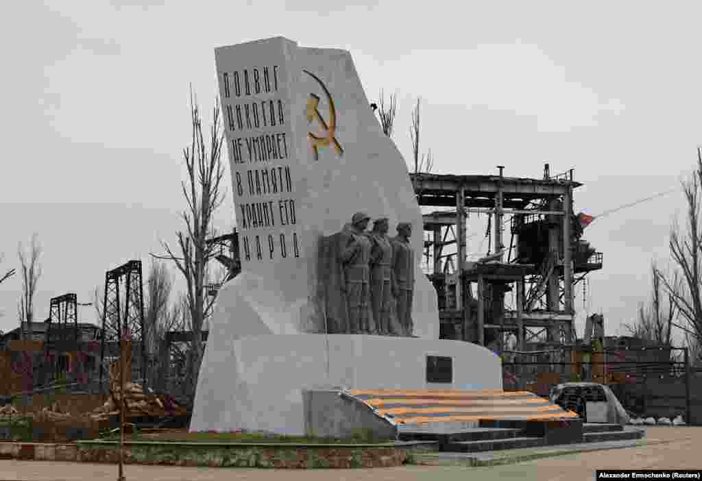 In areas around the theater, recent photos show prestige monuments, such as this war memorial photographed in February 2024, have been rebuilt, while much of the city’s infrastructure remains in ruins.