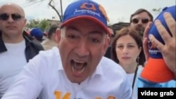 Armenia - Prime Minister Nikol Pashinian shouts threats against his critics during an election campaign event in Yerevan, May 18, 2026. 